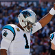Cam Newton, No. 1 of the Carolina Panthers, raises his fist in the end zone after scoring a touchdown during the fourth quarter against the New England Patriots at Gillette Stadium in Foxboro, Mass., on Oct. 1, 2017. (Jim Rogash/Getty Images)